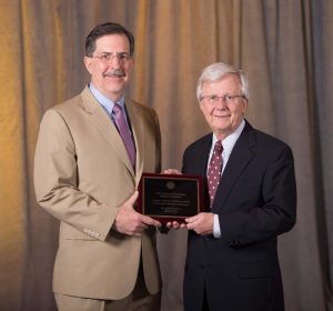 (L to R) Society of Toxicology Vice President-Elect Peter L. Goering, Ph.D., presents Richard Peterson, Ph.D., the Distinguished Toxicology Scholar Award.
