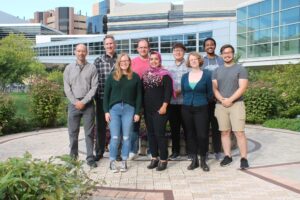 Group picture of Bugni lab members in garden infront of Rennebohm Hall