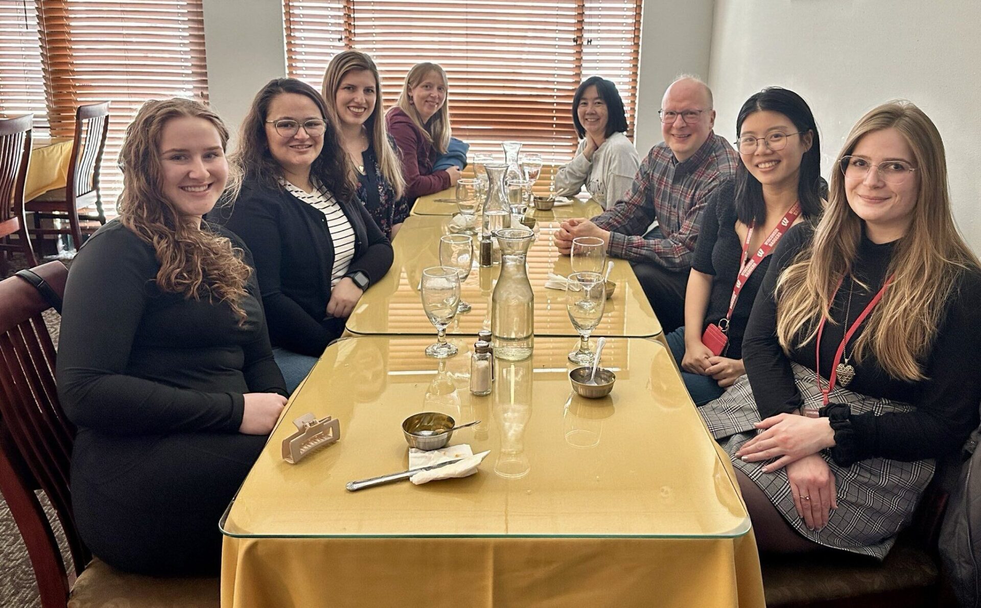 SAMS Lab members celebrating teamwork and camaraderie during lunch at a local Indian buffet
