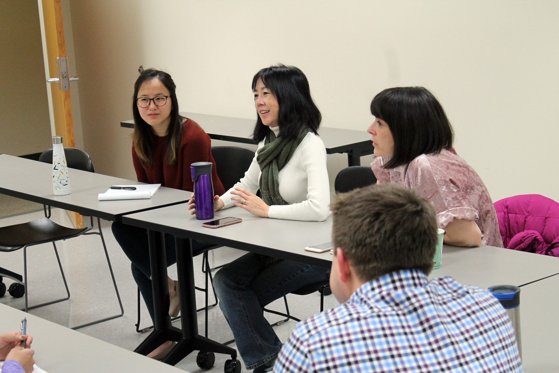 Michelle Chui teaching group of students