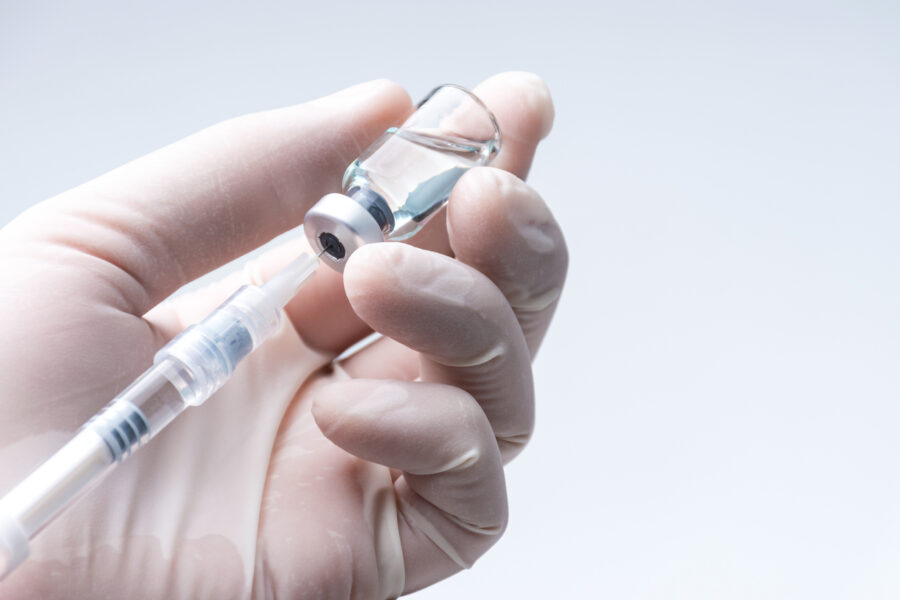 needle in vial preparing for injection
