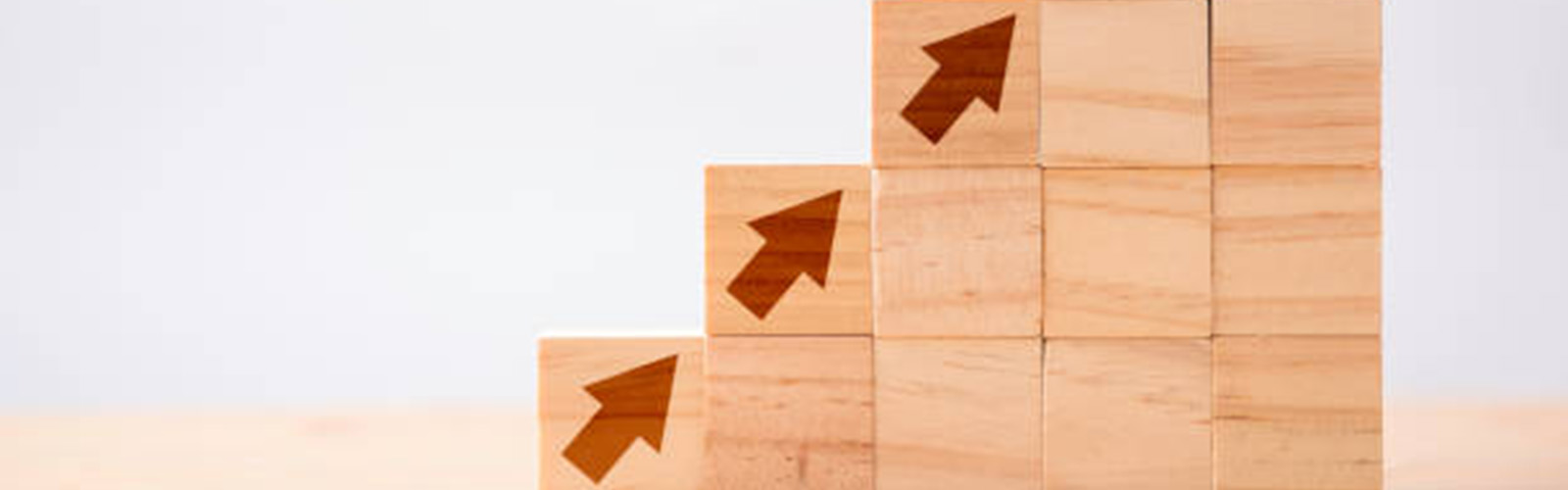 blocks with arrows on them creating steps up