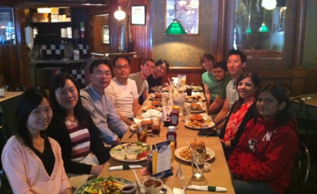 Hong research members eating dinner together at a restaurant