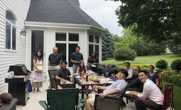 Hong Research members grilling out in a backyard