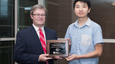 Hao Li receiving Zaman Saroya Award from Professor Charles Lauhon