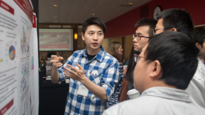 Hao Li presenting his research poster at the 2018 Pharmaceutical Sciences Graduate Student Retreat