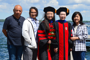Ao family, Ziyoung, and Jiaoyang after Hooding Ceremony