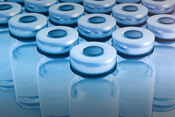 a bunch of vials lined up