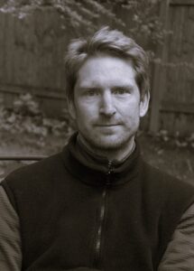 black and white headshot of Lucas Richert