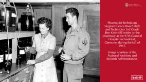 A female pharmacy technician sergeant and male technician 3rd grade fill medication bottles at a German hospital in 1945