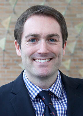 headshot of Warren Rose