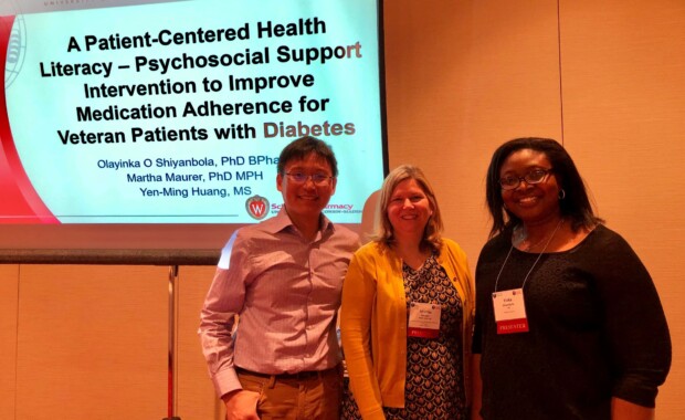 Prof. Shiyanbola with Martha Maurer former student Yen-Ming Huang at the WI Health Literacy Conference 2019