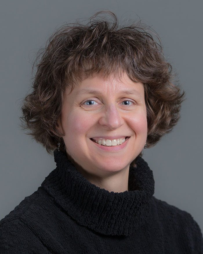 headshot of Denise Walbrandt Pigarelli