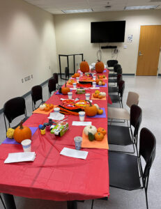 A table is ready for pumpkin carving