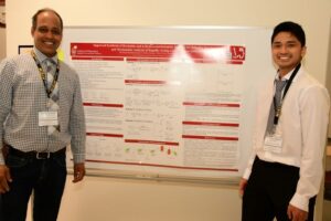 Wenthur Lab members standing next to their research for the MIKIW conference