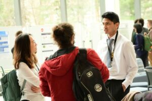 Wenthur Lab members talking together at the MIKIW conference