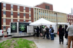 people lined up for a food truck in Iowa