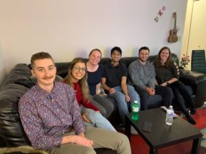 Wenthur lab members sitting on a couch together