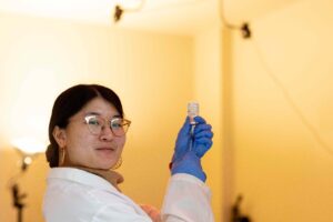 Grad student filling a syringe
