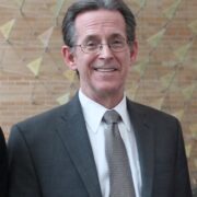 headshot of John Swann, SAS alumni