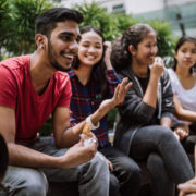 Students at an international program socialize outdoors together