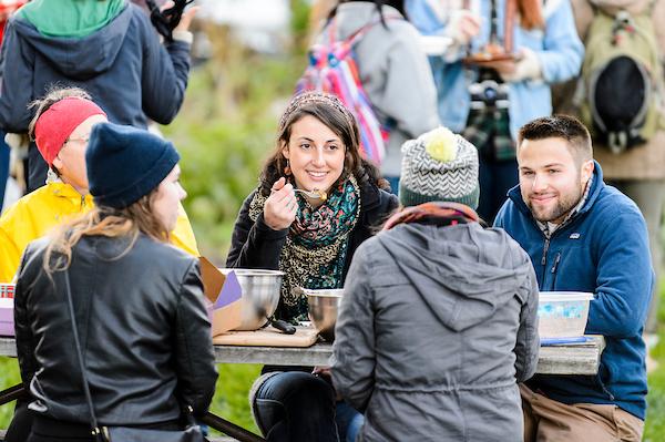 UW-Madison students enjoy a group dinner event at the Eagle Heights Community Gardens at the University of Wisconsin-Madison on Oct. 16, 2015. (Photo by Bryce Richter / UW-Madison)