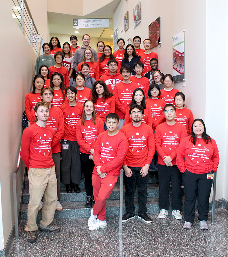 Pharmsci grad students pose together in Rennebohm Hall (Fall 2025)