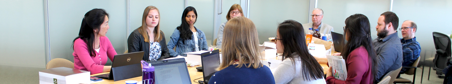 Members of the Chui Research Group discuss project details
