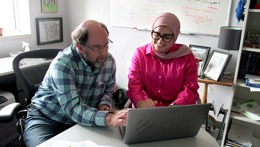 Associate Professor Jay Ford and Health Services Research in Pharmacy graduate student Sura AlMahasis discuss study findings.
