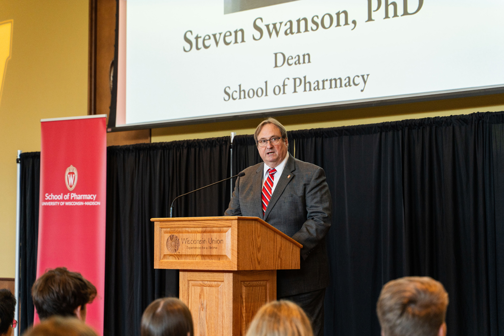 Steve Swanson, dean of the School of Pharmacy, speaks at the podium