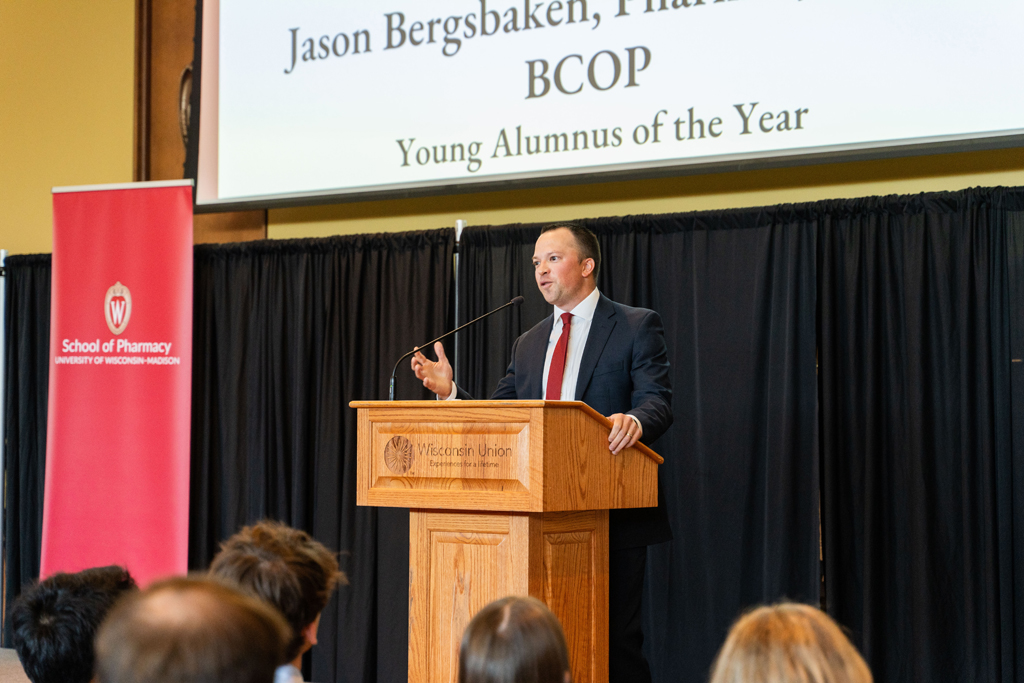 Jason Bergsbaken speaks at the podium