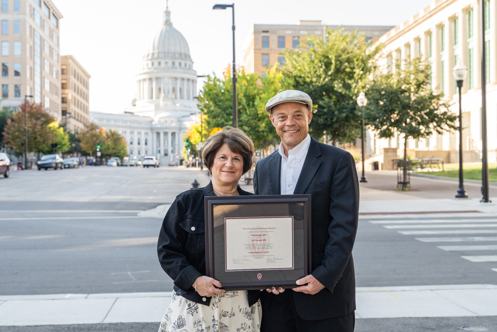 Jeff and Patti Langer pose with their award