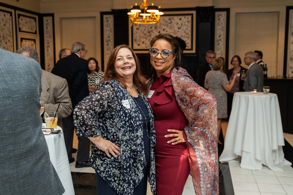 Tolanda Tolson poses with an attendee.