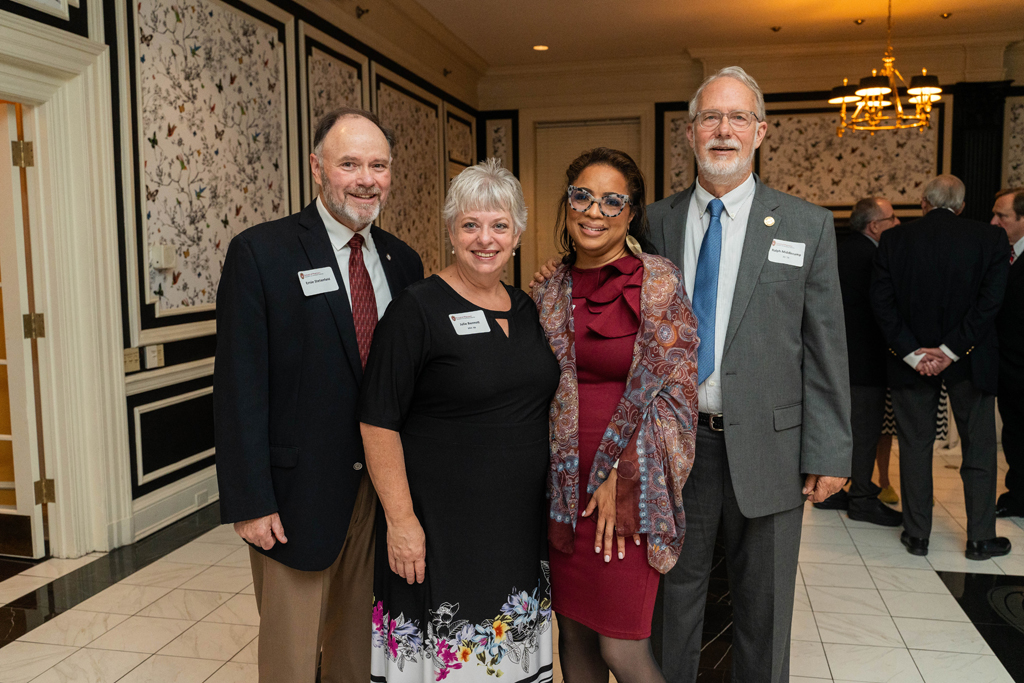 Yolanda Tolson poses with Ernie Stetenfeld, Julie Bennett, and Ralph Middlecamp.