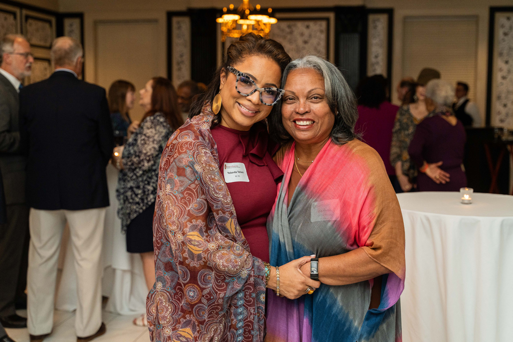 Eva Vivian and Yolanda Tolson pose for a photo.