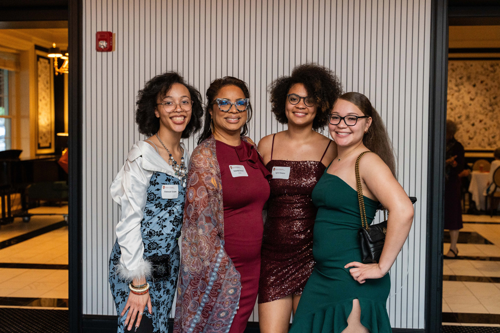 Yolanda Tolson poses for a photo with family and friends