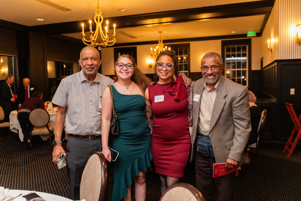 Yolanda Tolson poses for a photo with family and friends.