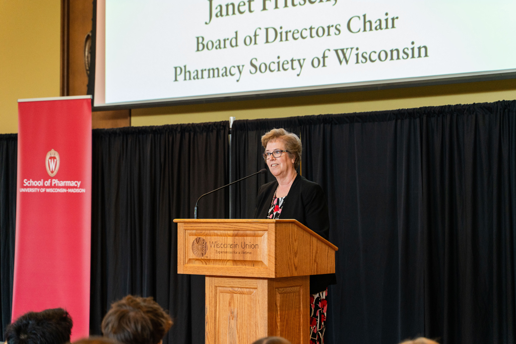 Janet Fritsch speaks at a podium