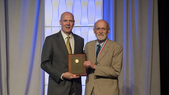 Palmer Taylor (right) accepts the 2017 AACP Volwiler Research Achievement Award from Joseph T. DiPiro, Pharm.D., Dean and Archie O. McCalley Chair, Virginia Commonwealth University School of Pharmacy; and 2016-2017 AACP President.