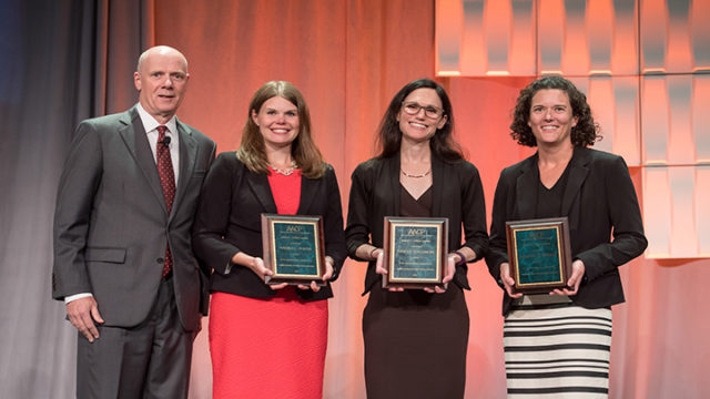 L-r: AACP President, Dr. Joseph DiPiro, presents Andrea Porter, Casey Gallimore, and Susanne Barnett with the 2017 Rufus A. Lyman Award.