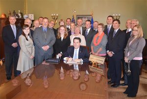 Wisconsin Governor Scott Walker signs Senate Bill 251 into law.