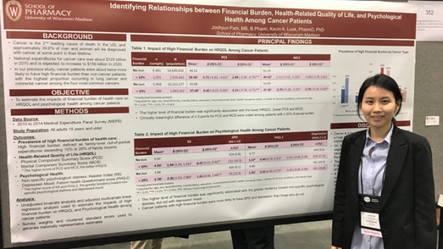 SAS graduate student Joohyun Park stands by her award-winning poster at APHA.