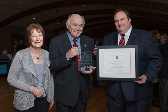 Citation recipient Wayne Anderson (center) with his wife (left), and Dean Steve Swanson (right)