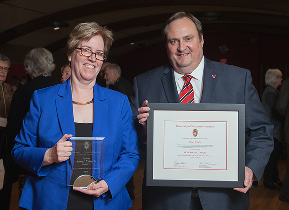 Citation recipient Janet Fritsch (left) with Casey Gallimore of the Pharmacy Practice Division (right)