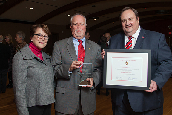 Citation recipient Bill Mellon (center) with his wife (left) and Dean Steve Swanson (right)