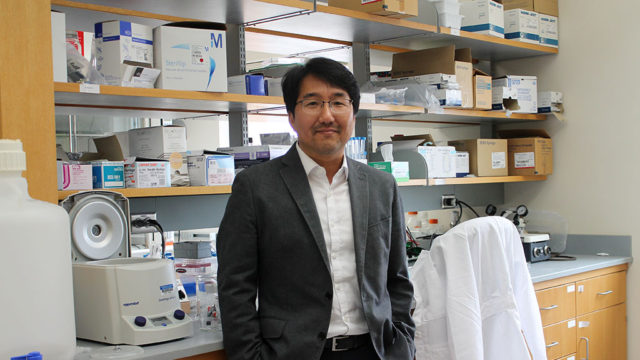 Seungpyo Hong standing in his lab