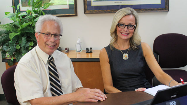 Bob Breslow at a table with Beth Martin