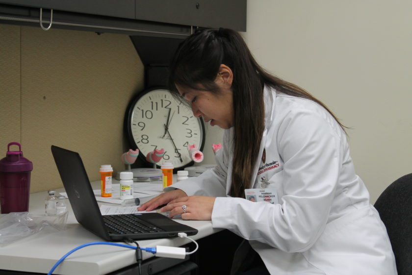 A PharmD student completing the telepharmacy simulation.