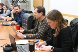 Eric Buxton (center) at a meeting.