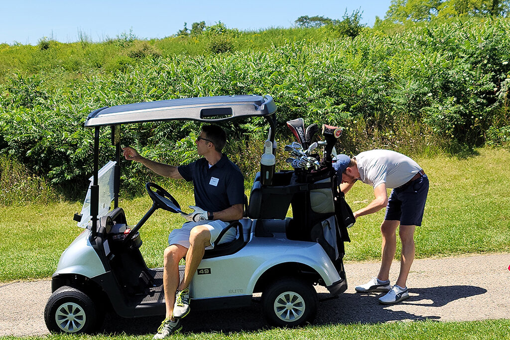 Pharm alum in a golf cart